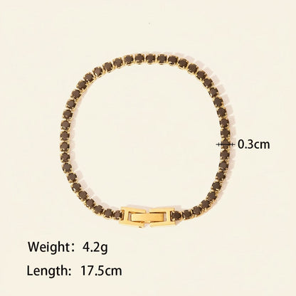 Seraphina Treasures Albina bracelet with black crystal zircon accents and gold-tone clasp. 17.5cm length.