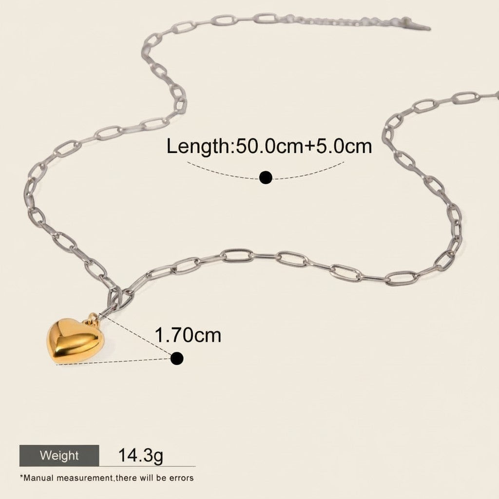 Seraphina Treasures Aureline necklace with a gold heart pendant on a silver chain. Waterproof and hypoallergenic.