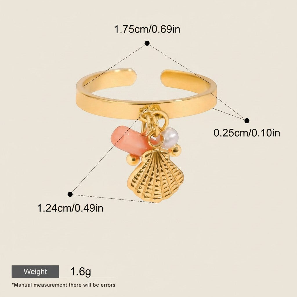 Seraphina Treasures Aurelis gold ring with pink coral, pearl, and shell charm. Adjustable, waterproof, hypoallergenic.