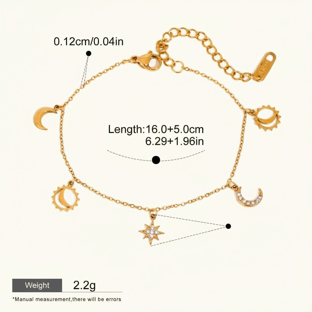 Seraphina Treasures Camilla gold-tone bracelet with sun, moon, and star charms. Features diamond-like accents and adjustable length.