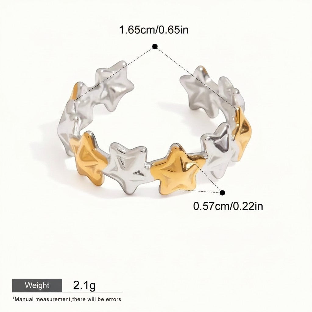 Seraphina Treasures Cassiara adjustable ring with alternating silver and gold stars. Waterproof and hypoallergenic.