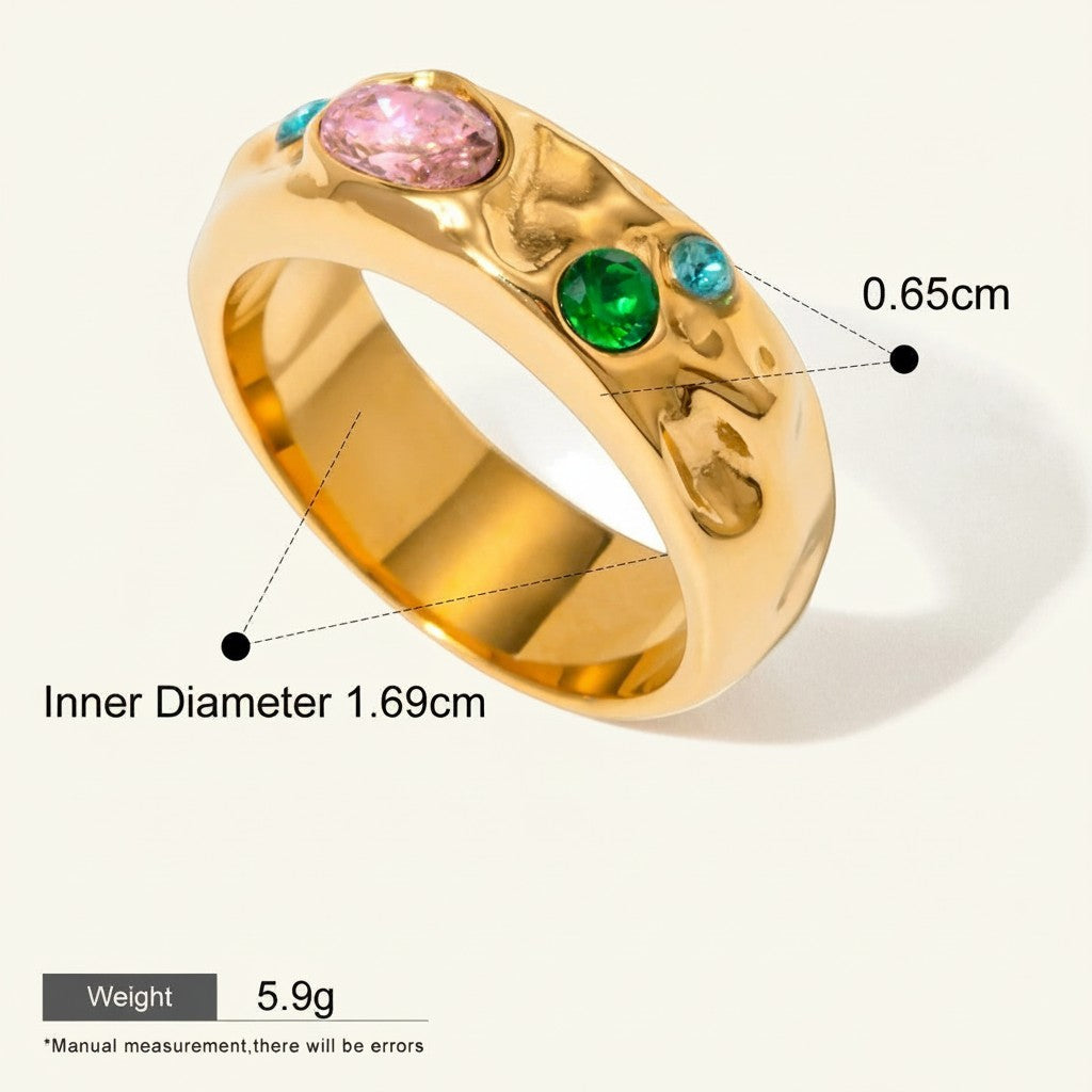 Seraphina Treasures Corvian gold ring with pink, green, and blue gemstones. Waterproof and hypoallergenic.