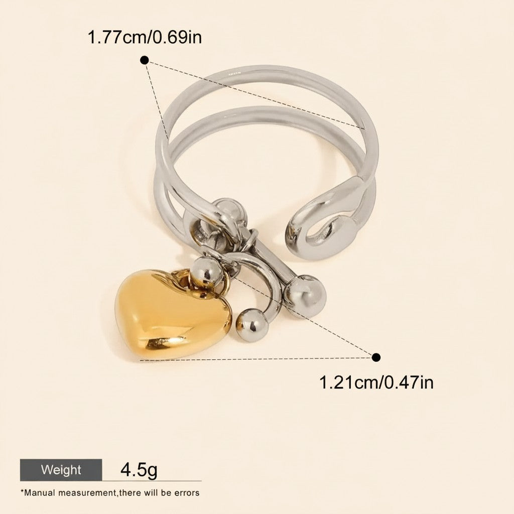 Seraphina Treasures Cressida double-layer silver ring with gold heart pendant. Open adjustable design.