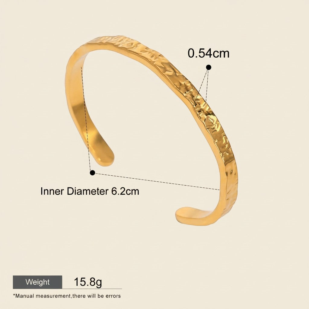 Seraphina Treasures Cyrine gold-tone open bangle with hammered texture, 0.54cm width, 6.2cm inner diameter.