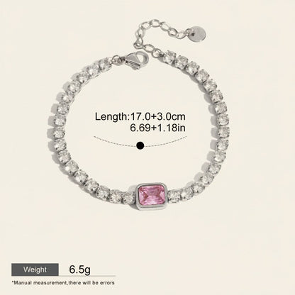 Seraphina Treasures Domitilla bracelet with clear and pink square zirconia stones, silver-tone metal, and adjustable clasp.
