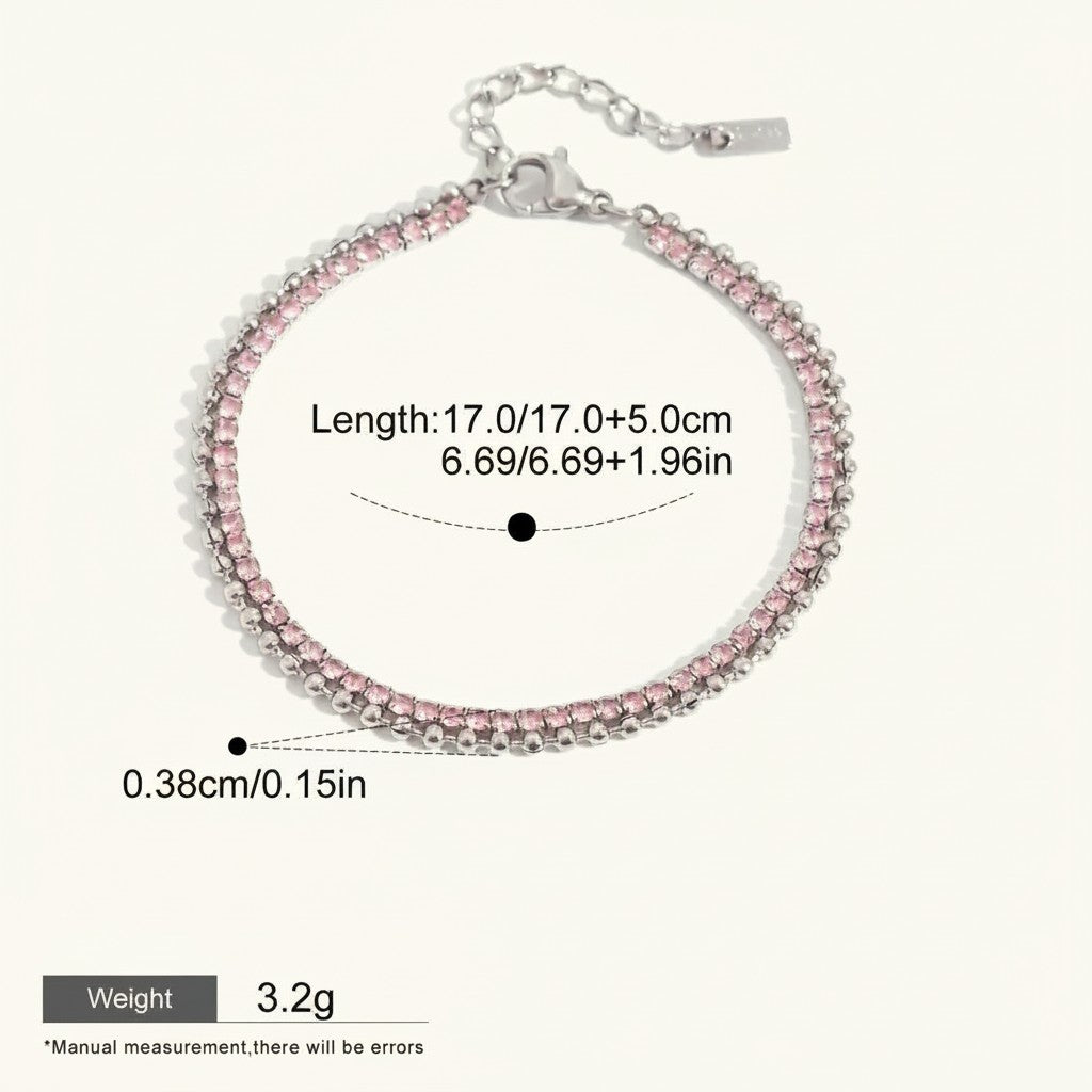 Seraphina Treasures Eidolon bracelet with two delicate layers of pink rhinestones and silver-tone metal chain. Adjustable length.