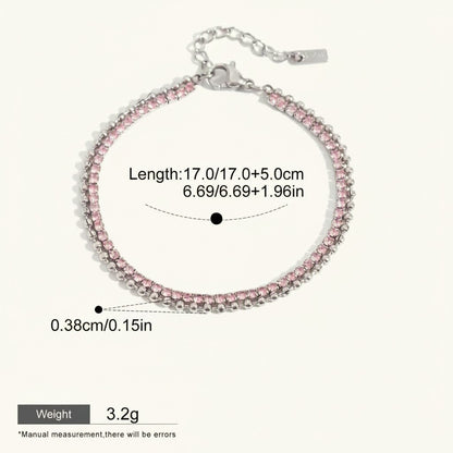 Seraphina Treasures Eidolon bracelet with two delicate layers of pink rhinestones and silver-tone metal chain. Adjustable length.