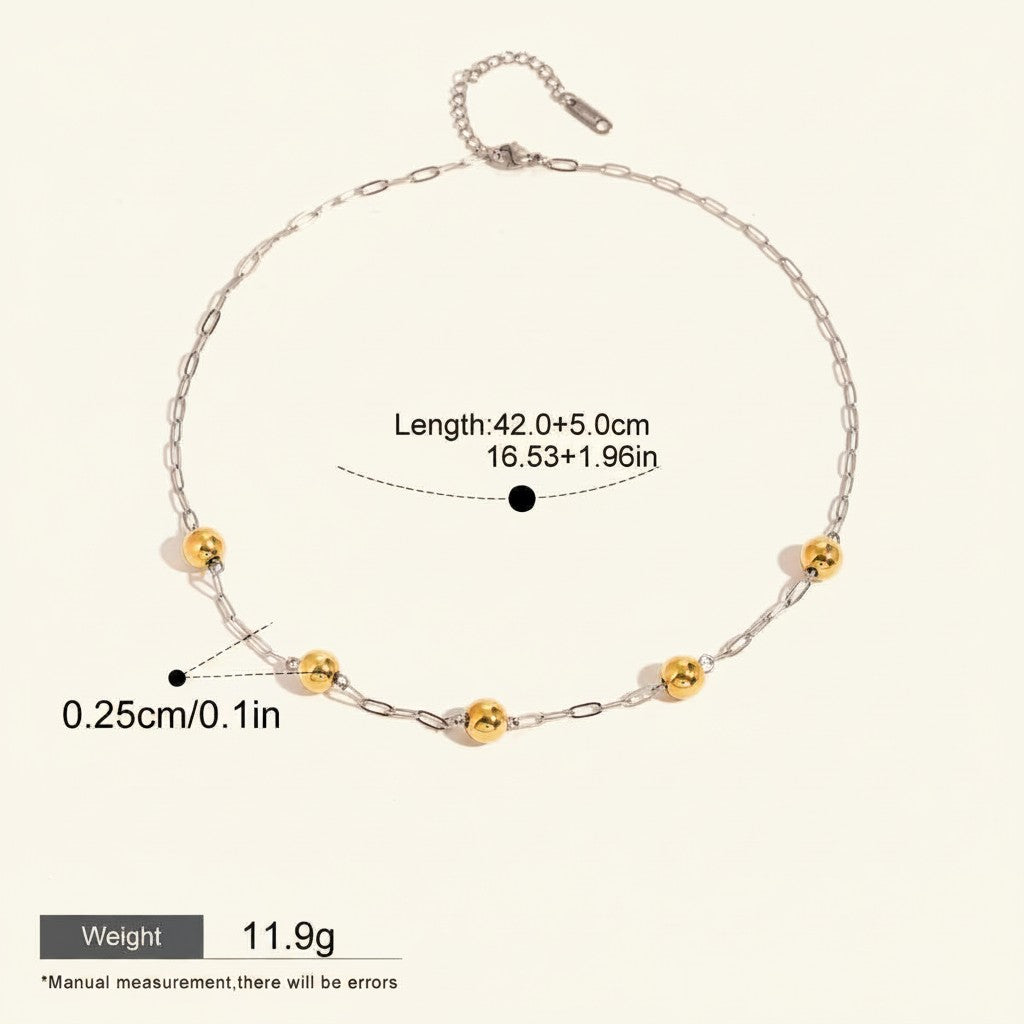 Seraphina Treasures Eosphor necklace with mixed metal chain and gold beads. Waterproof and hypoallergenic.