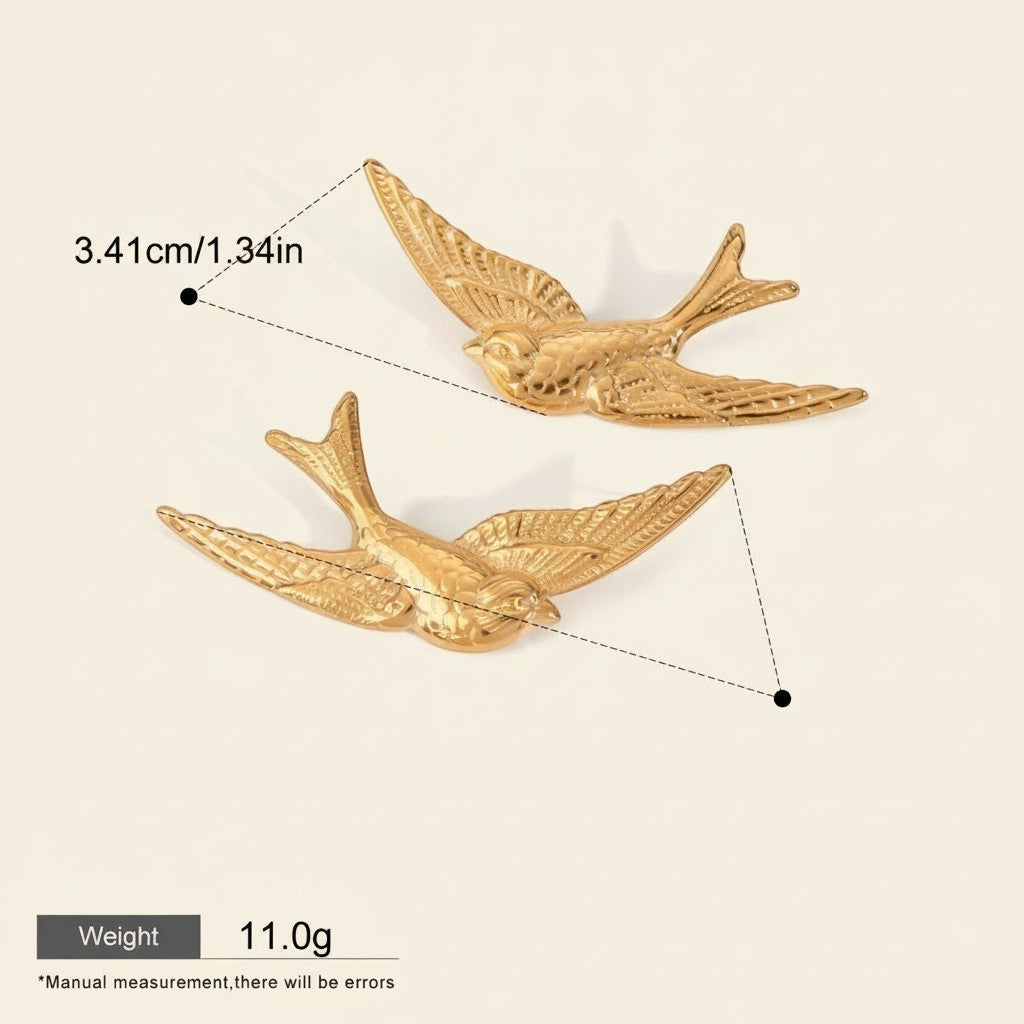 Seraphina Treasures gold flying bird hair clip, elegant swallow design, 6.05cm long.