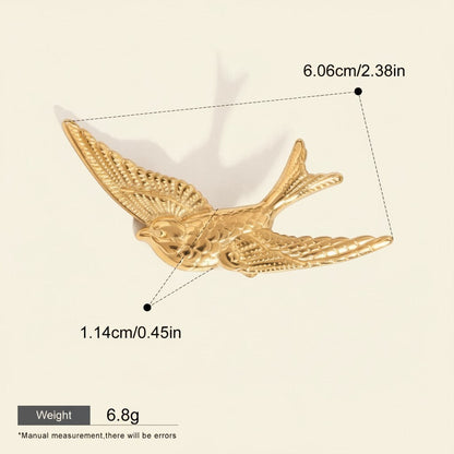 Seraphina Treasures gold metal flying bird hair clip, elegant design, 6.06cm length.