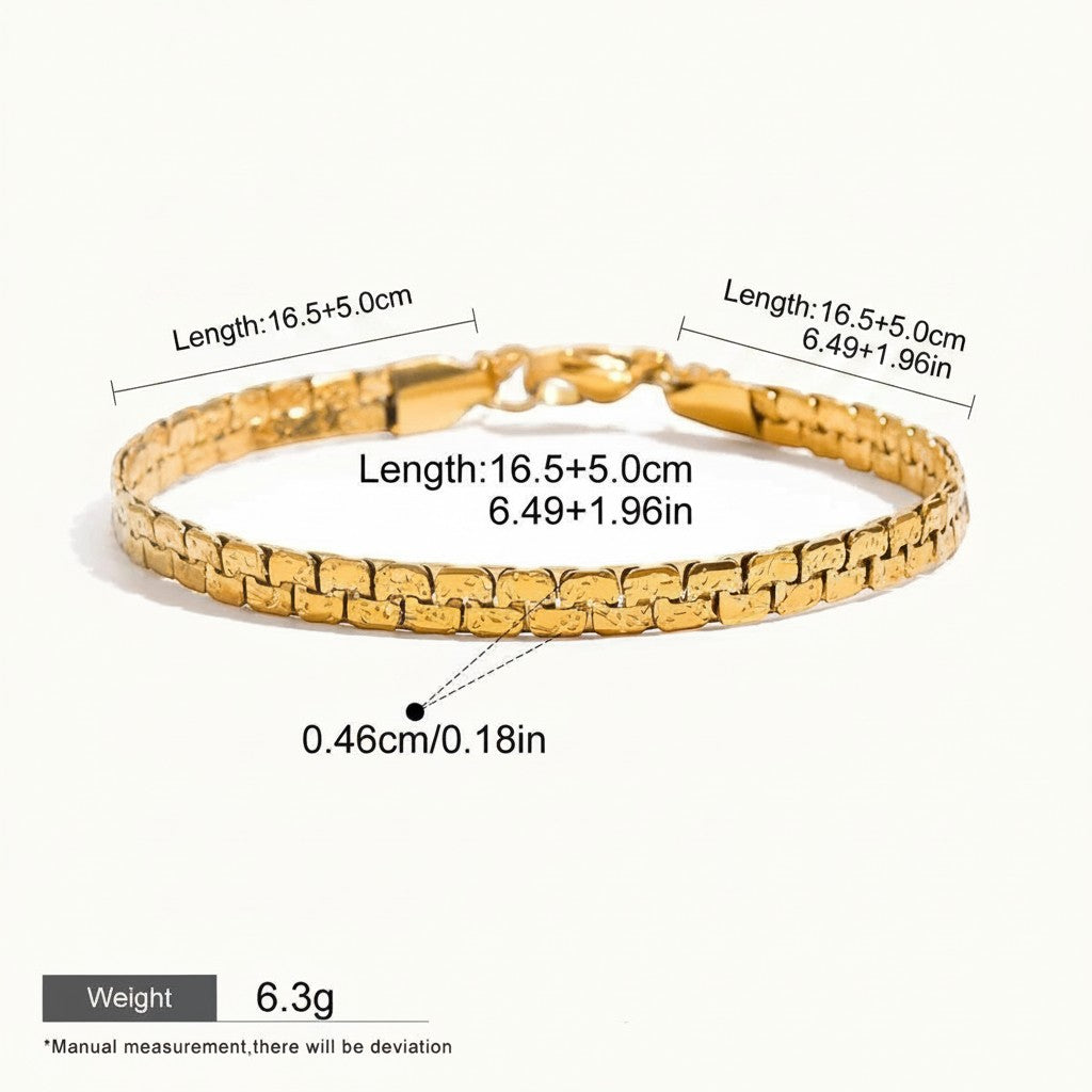 Seraphina Treasures gold-tone metal bracelet with a smooth, flowing design, symbolizing resilience and harmony. Features adjustable length and hypoallergenic properties.