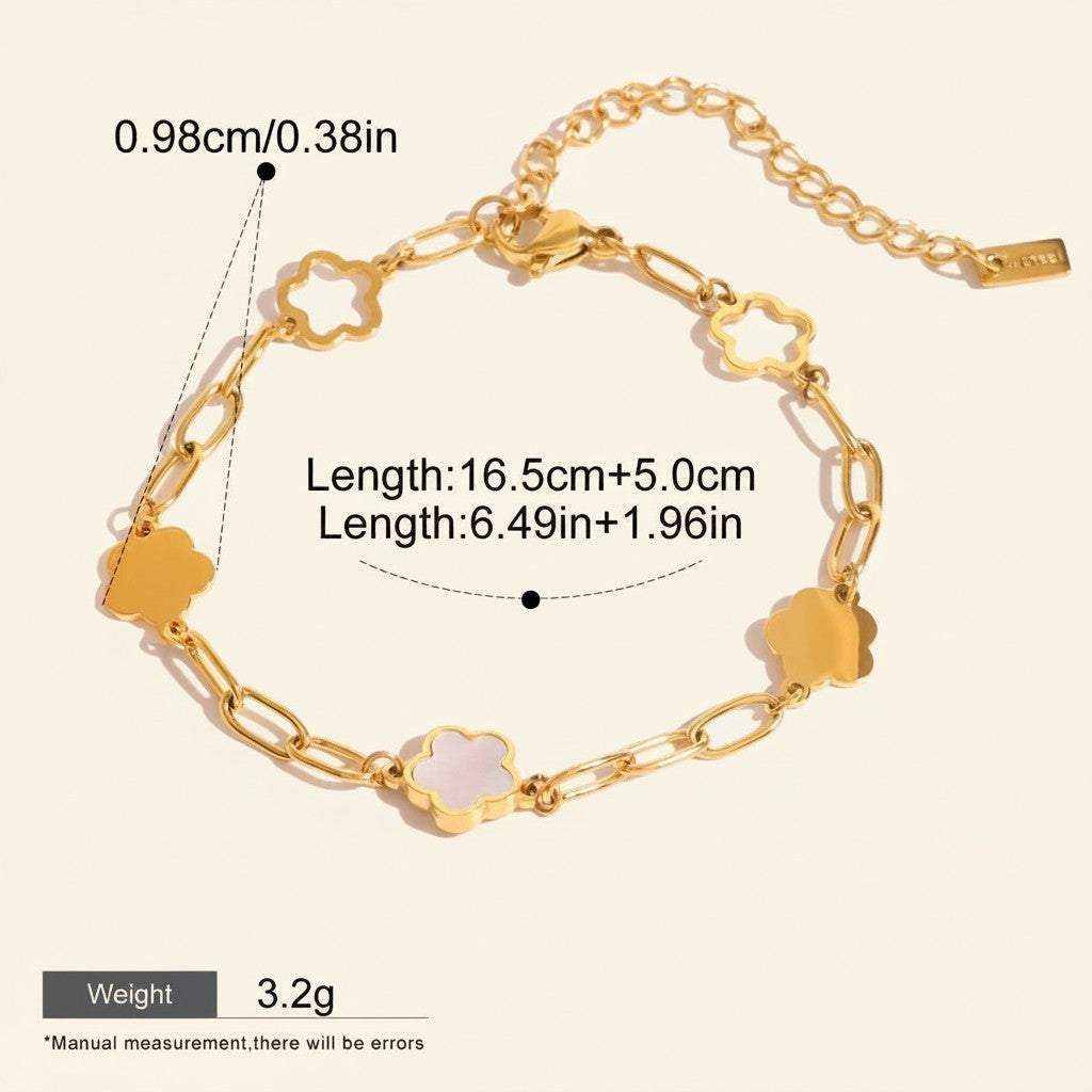 Seraphina Treasures gold-tone bracelet with clover charms and white inlay, adjustable chain, 16.5cm+5cm length.