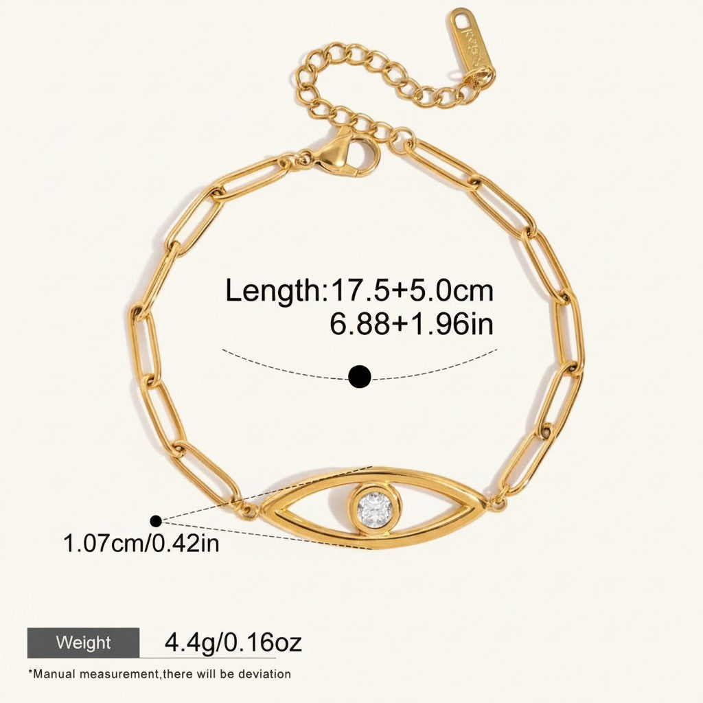 Seraphina Treasures gold-tone stainless steel bracelet with paperclip chain and a central evil eye charm featuring a clear zircon.