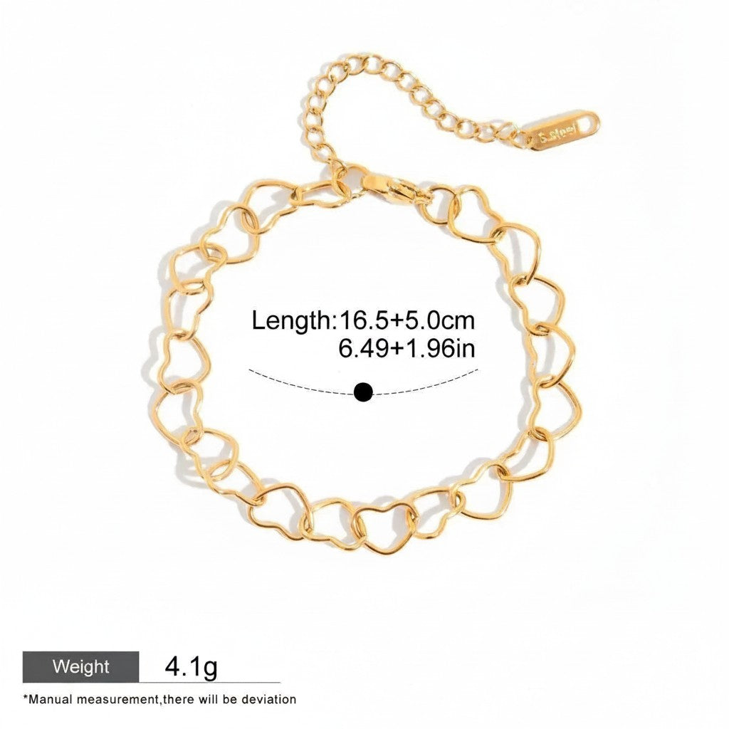 Seraphina Treasures gold-tone stainless steel bracelet with interlocking heart links. Adjustable chain.