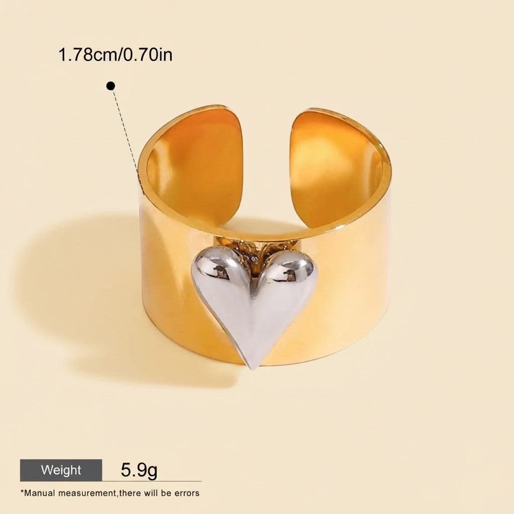 Seraphina Treasures Orvara gold ring with a silver heart accent. Waterproof and hypoallergenic.