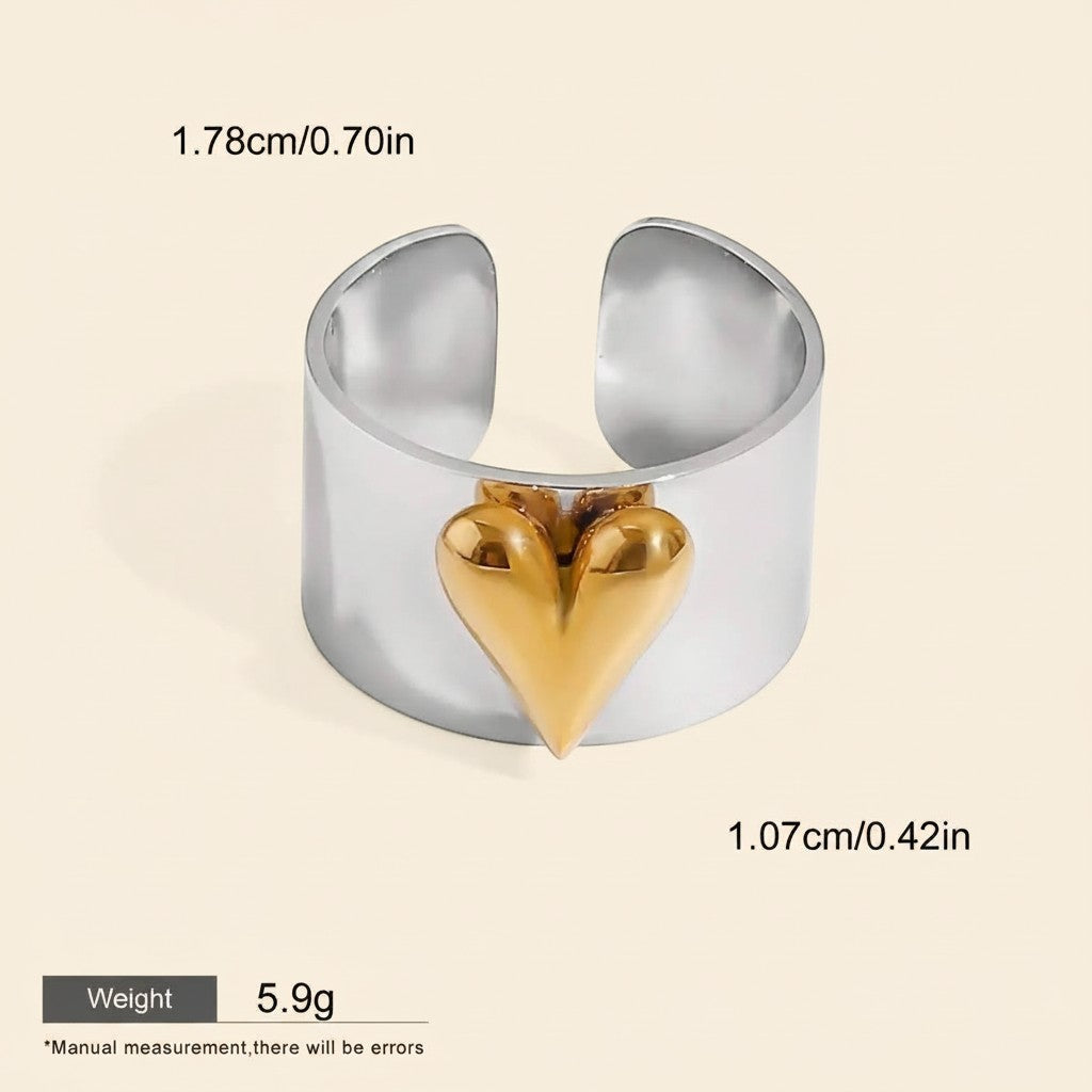Seraphina Treasures Orvara ring with a gold heart accent on a silver band. Waterproof and hypoallergenic.