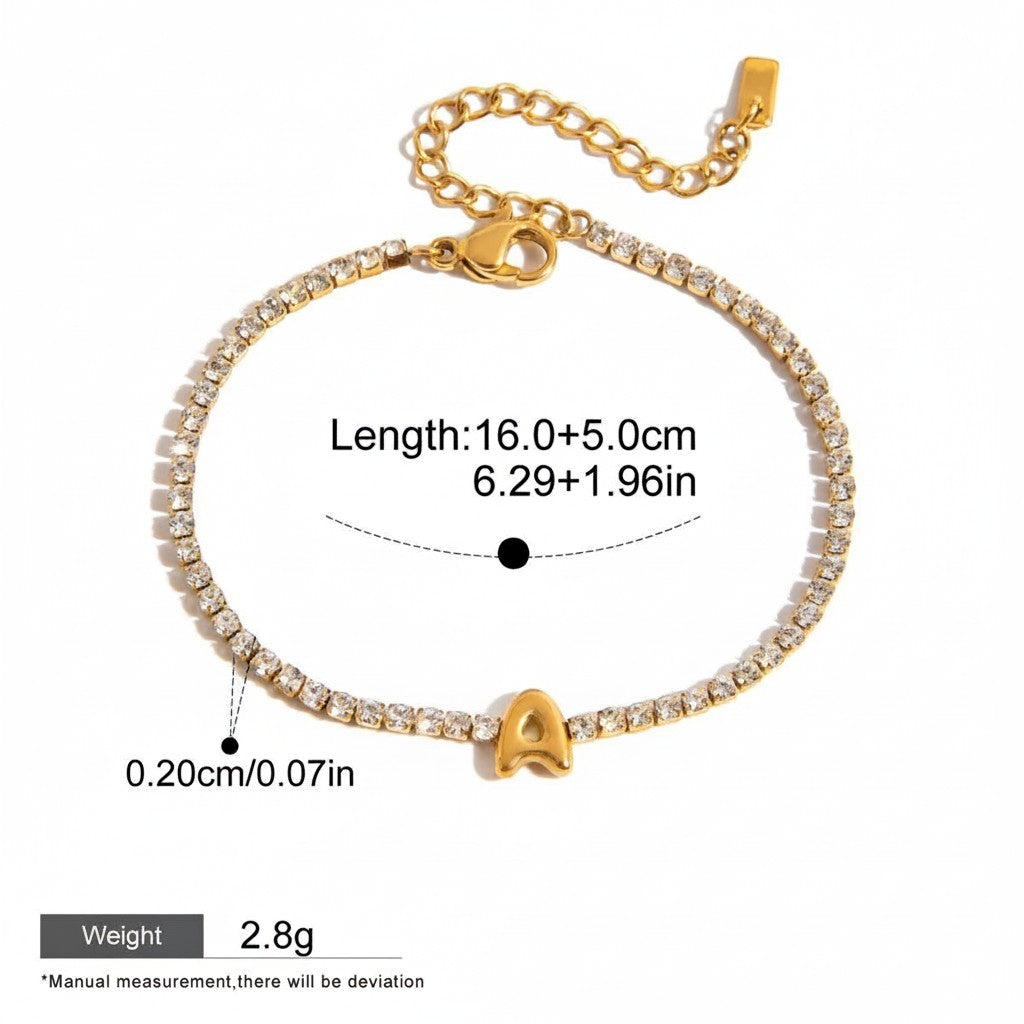 Seraphina Treasures gold-tone bracelet with clear zirconia stones and a gold initial 'A' pendant. Waterproof and hypoallergenic.