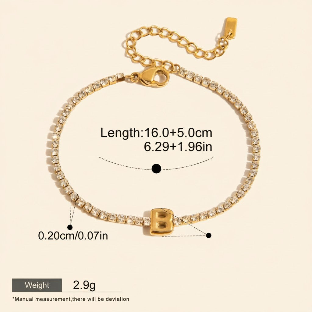 Seraphina Treasures gold-tone bracelet with clear zirconia stones and a gold letter B pendant. Adjustable chain.