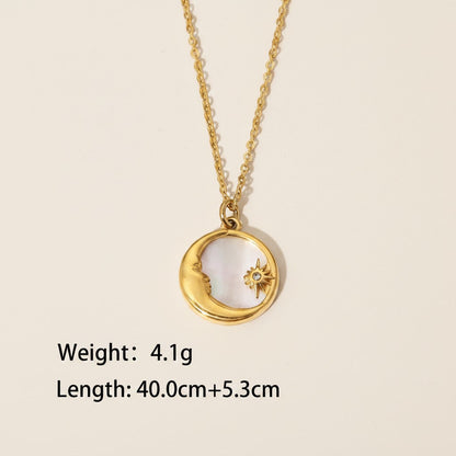 Seraphina Treasures gold necklace with a crescent moon and star pendant featuring natural shell inlay. Adjustable length.