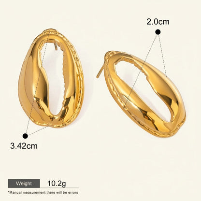 Seraphina Treasures gold abstract oval drop earrings with textured edges. Dimensions 3.42cm x 2.0cm.