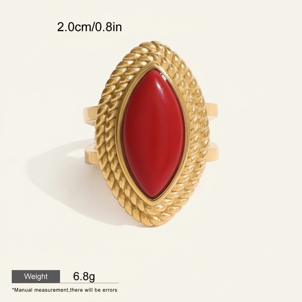 Seraphina Treasures gold-tone adjustable ring with a red marquise-shaped stone and rope-like textured border.