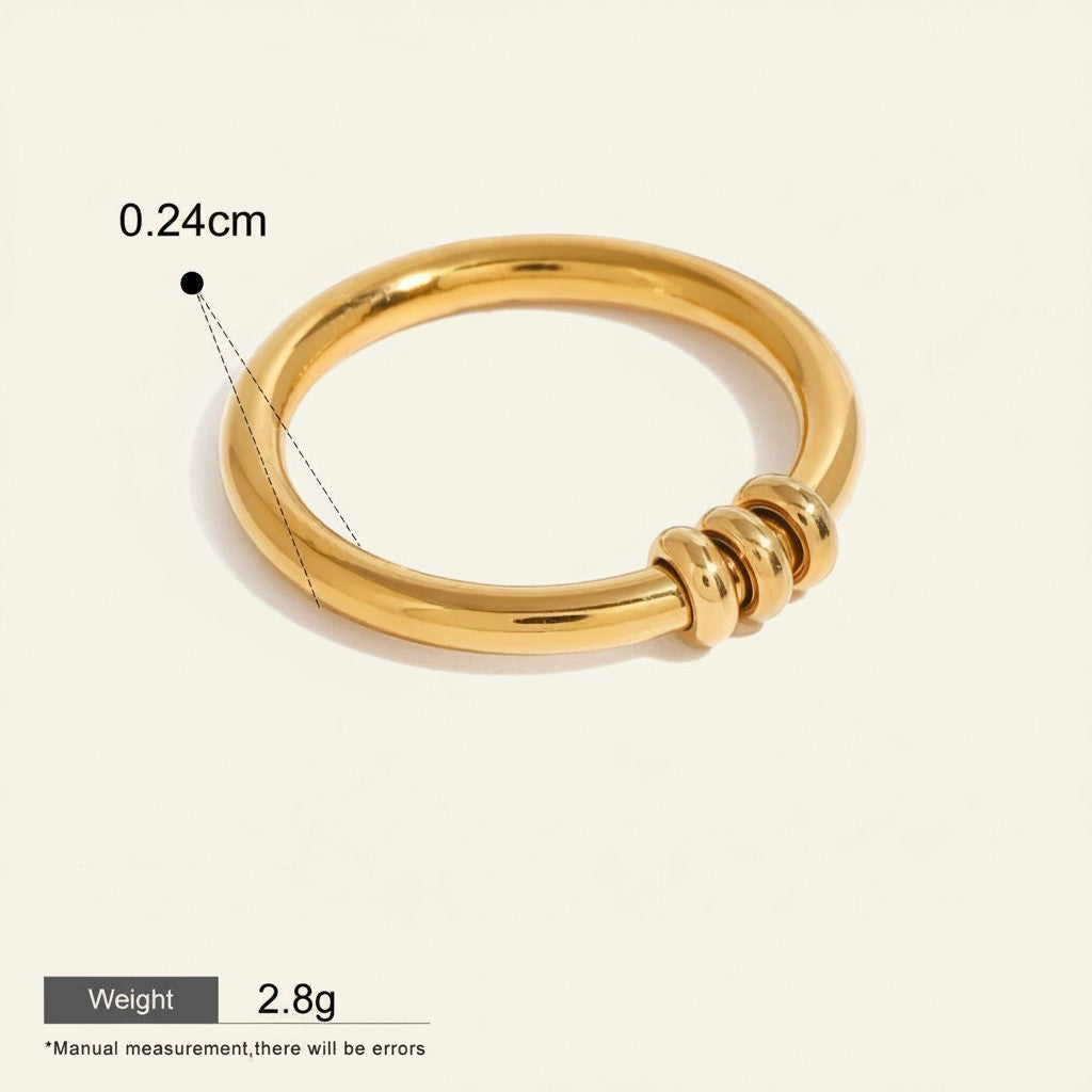 Seraphina Treasures gold-tone stainless steel ring with stacked bead detail, 0.24cm width, waterproof and hypoallergenic.