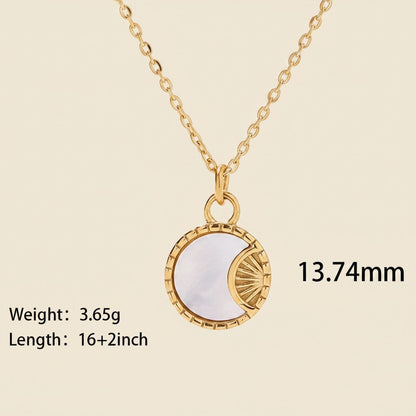 Seraphina Treasures gold necklace with a round pendant featuring a white shell inlay and a sunburst design.