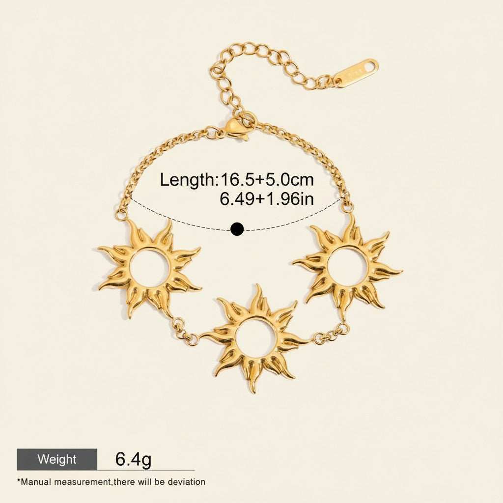 Seraphina Treasures gold-tone bracelet with three hollow sun charms, adjustable length, waterproof and hypoallergenic.