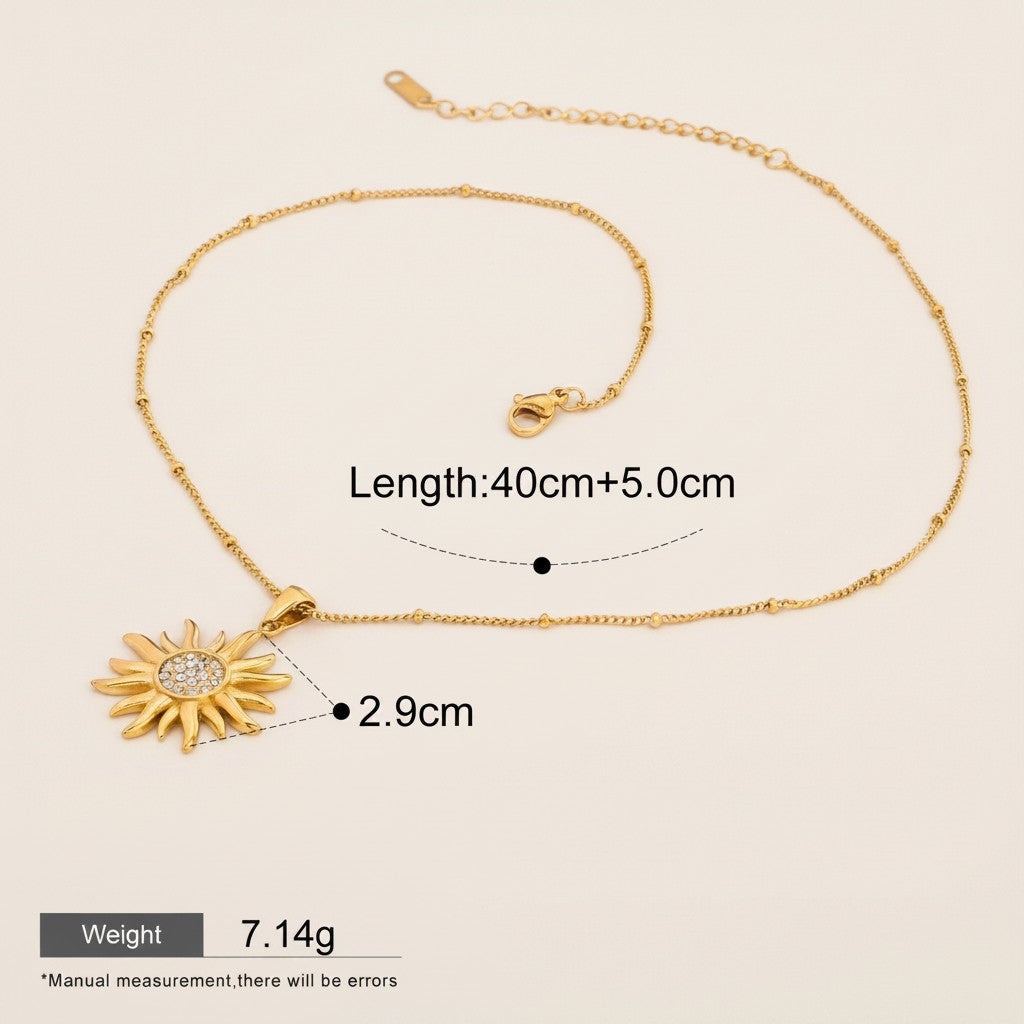 Seraphina Treasures gold sun pendant necklace with zirconia stones and beaded chain, 40cm+5cm length.