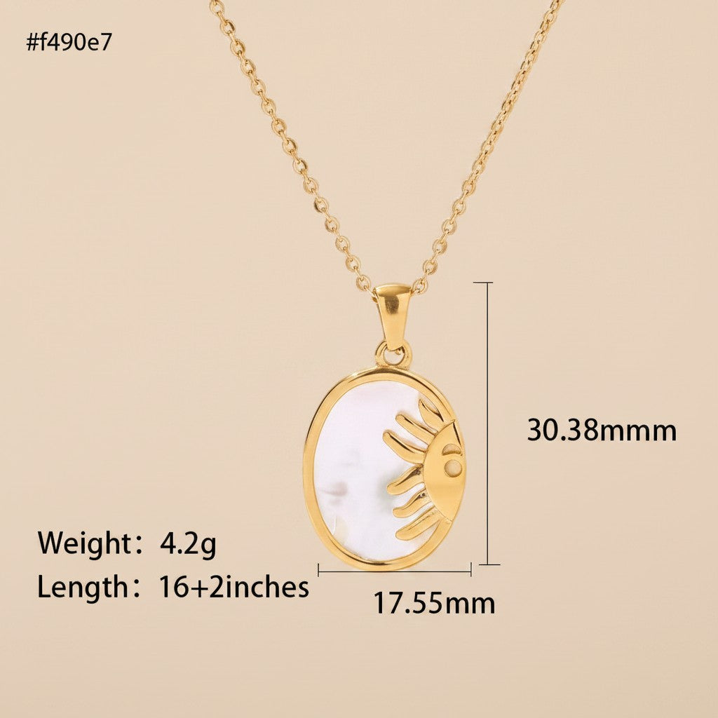 Seraphina Treasures gold sun pendant necklace with natural shell inlay, oval shape, 16+2 inch chain.