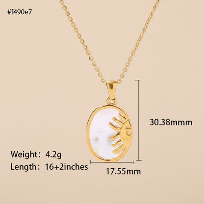 Seraphina Treasures gold sun pendant necklace with natural shell inlay, oval shape, 16+2 inch chain.