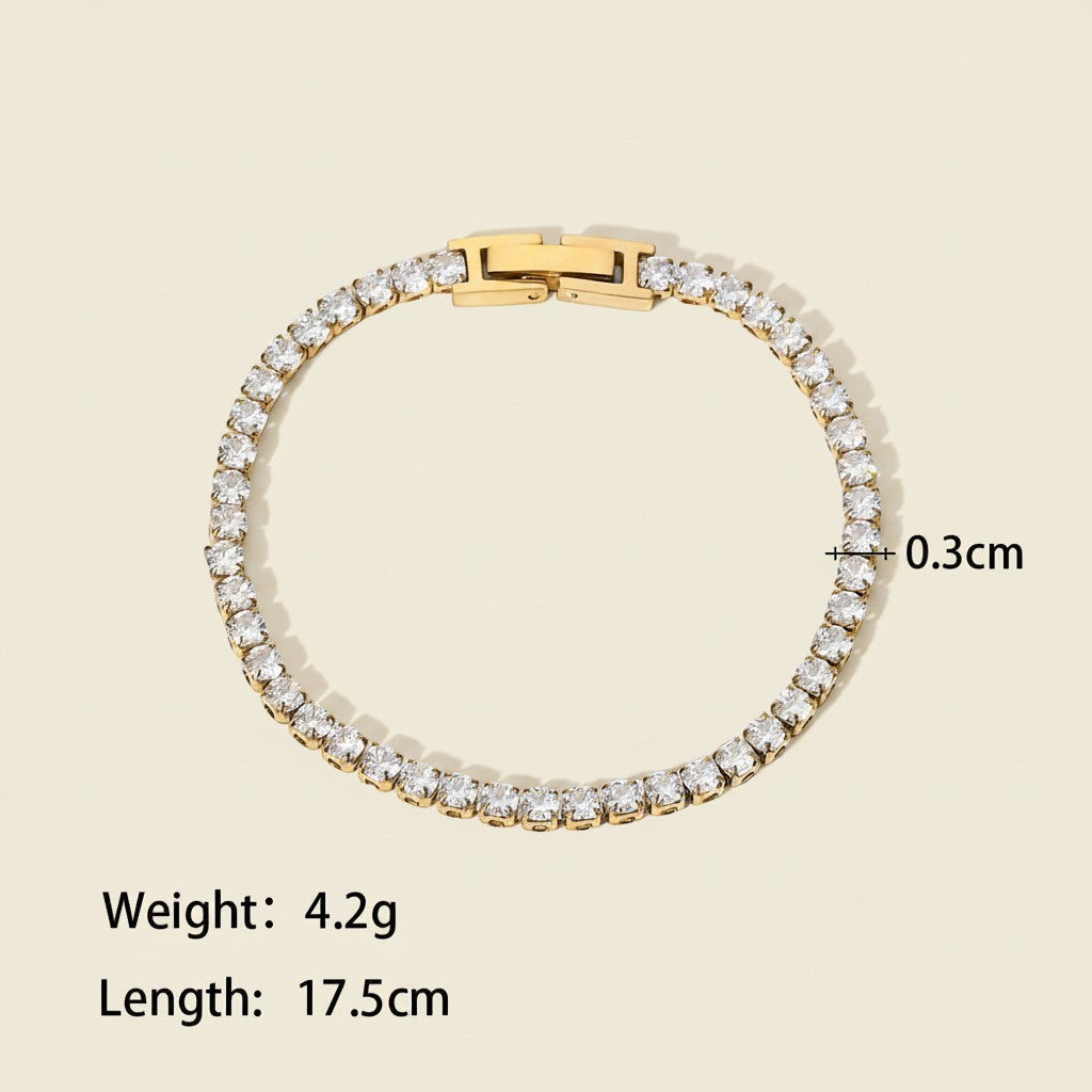 Seraphina Treasures Albina gold tennis bracelet with crystal zircon accents, 17.5cm length, 0.3cm width.