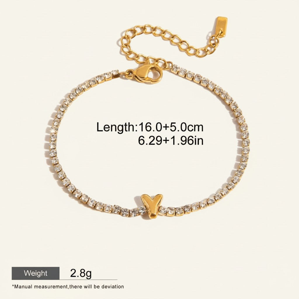 Seraphina Treasures gold-tone bracelet with clear zirconia stones and a gold letter Y pendant, adjustable length.