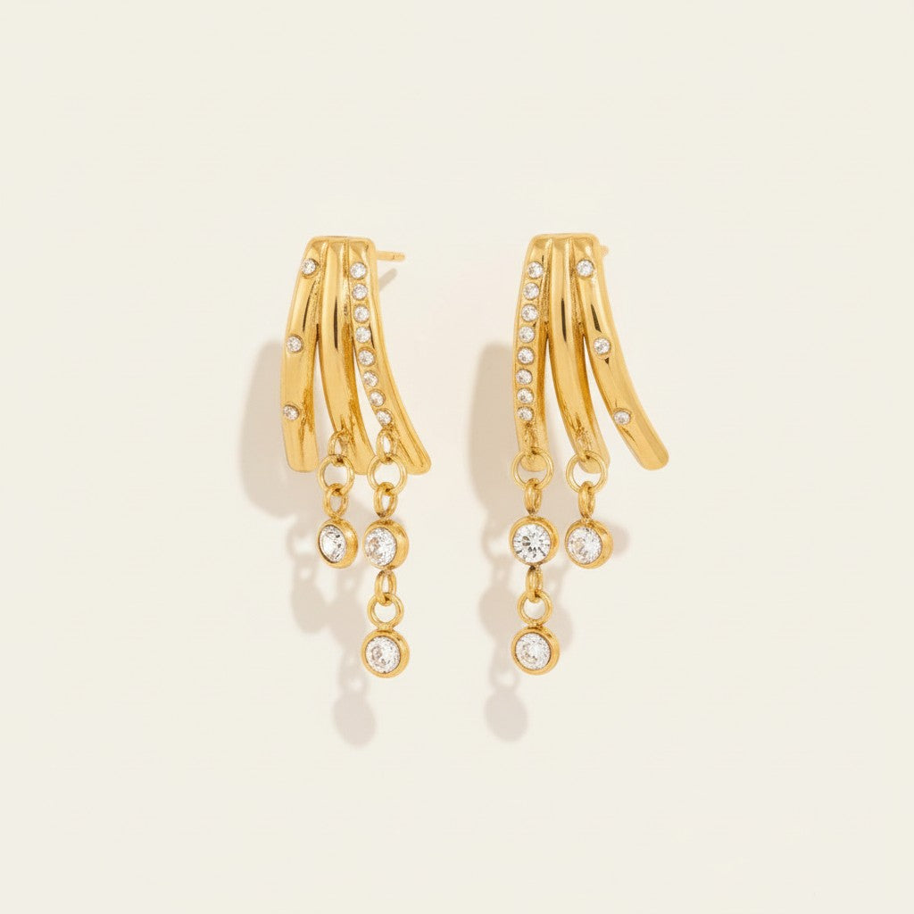 Seraphina Treasures gold drop earrings with clear zircon stones, celestial-inspired design.