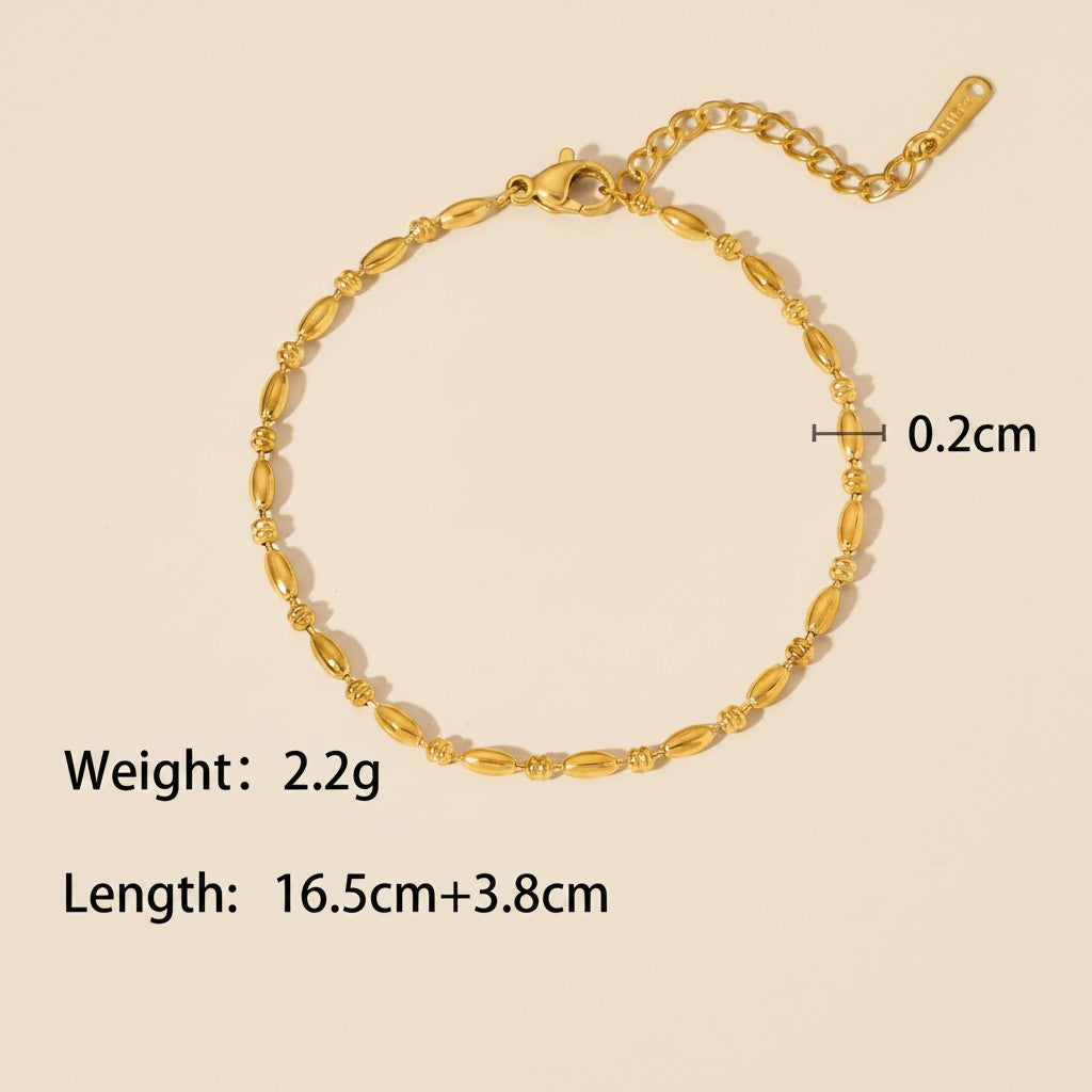 Seraphina Treasures Lumina gold bracelet with oval beads and adjustable chain, 0.2cm width.