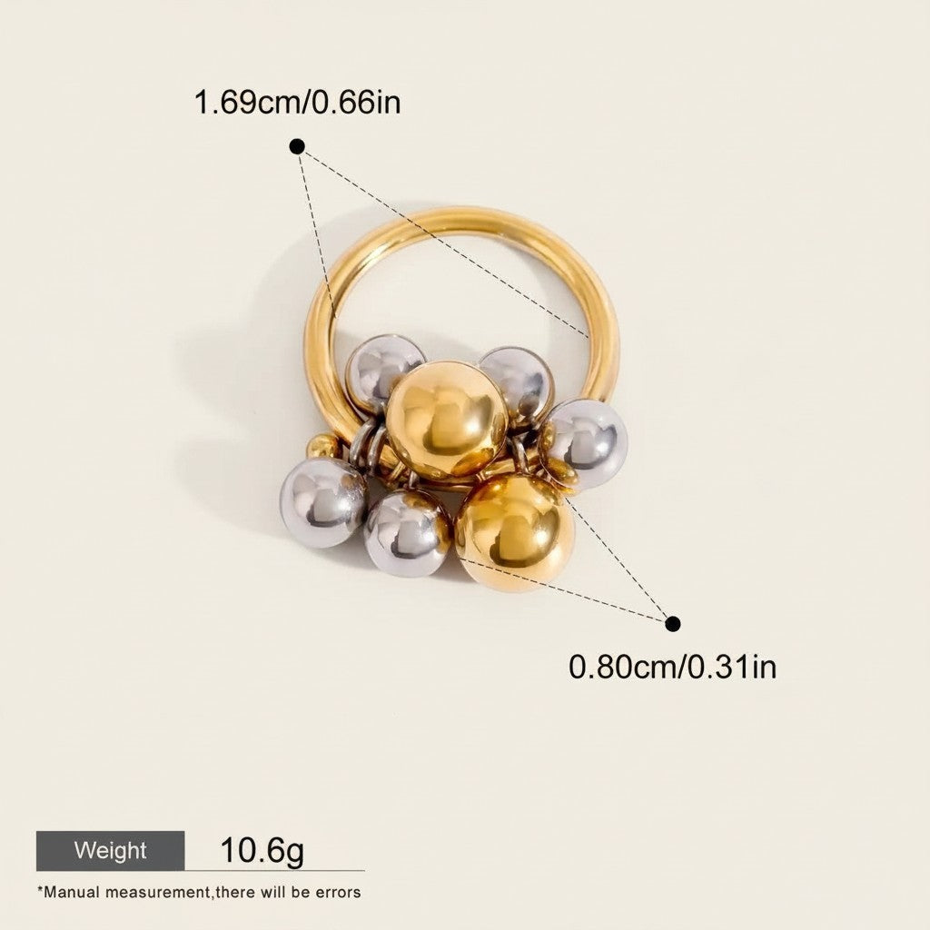 Seraphina Treasures Luxadore ring with gold hoop and dangling silver and gold beads. Waterproof and hypoallergenic.