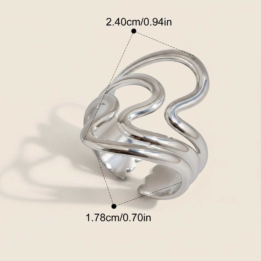 Seraphina Treasures Lyrica silver ring with irregular open design and glossy ripple texture.