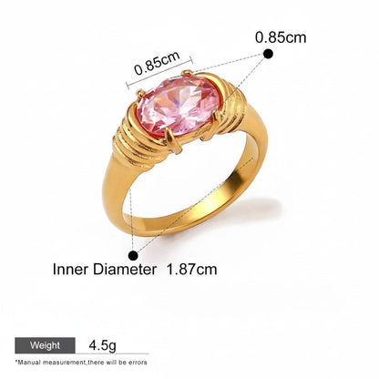 Seraphina Treasures Meliora gold ring with a large oval pink gemstone and textured band. Waterproof and hypoallergenic.
