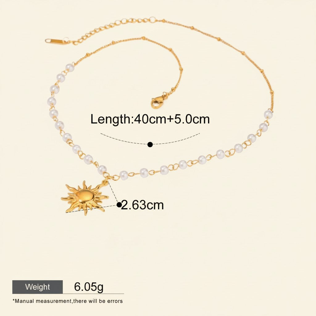 Seraphina Treasures Oria necklace with gold chain, pearls, and sun pendant. Adjustable length 40+5cm.