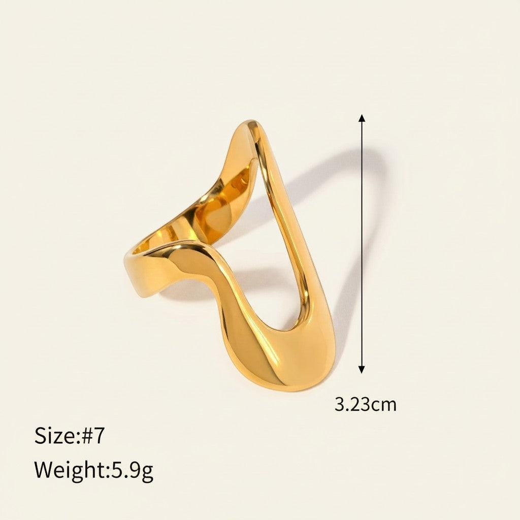 Seraphina Treasures Orvian gold abstract ring with a modern, sleek, and open design. Size #7.