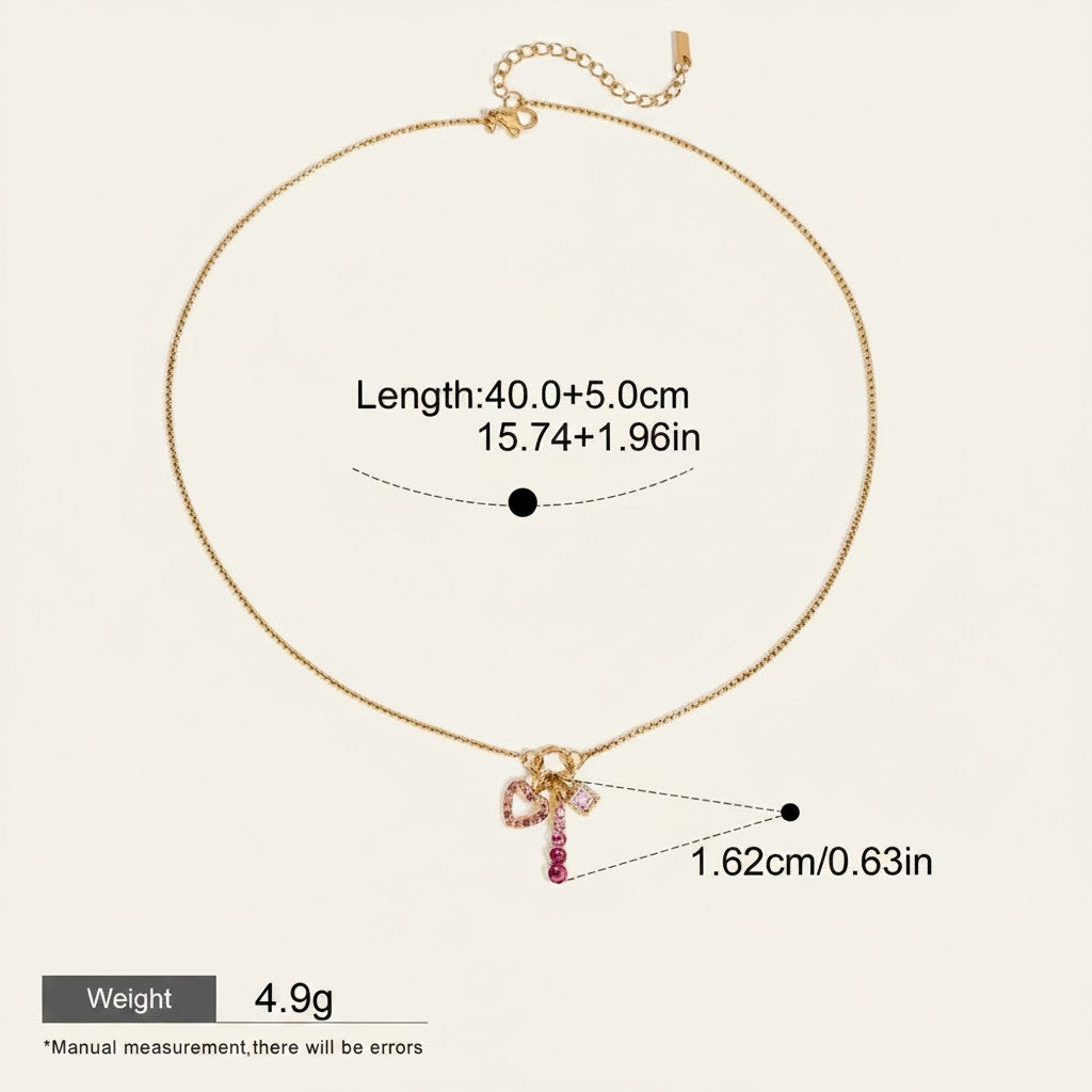 Seraphina Treasures Carys necklace with a gold chain and a pink heart-shaped zirconia pendant.