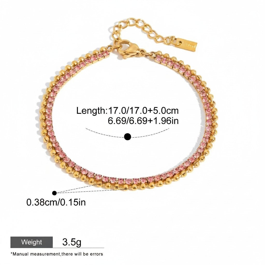 Seraphina Treasures gold-tone bracelet with two rows of pink rhinestones and gold beads. Adjustable chain.