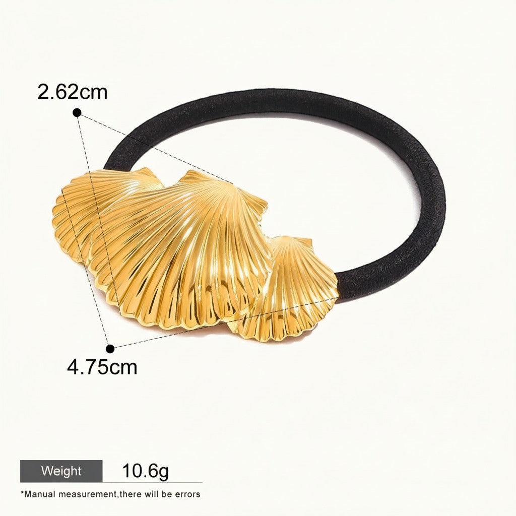 Seraphina Treasures Ishtar Seashell Ribbed Hair Rope, black rubber hairband with gold seashell charm. Comfortable, firm hold.
