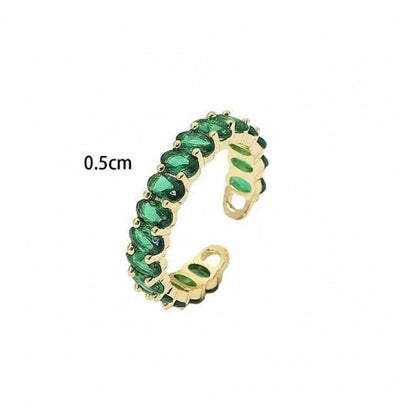 Seraphina Treasures Seraphiel adjustable ring with green cubic zirconia stones and gold-tone copper band.