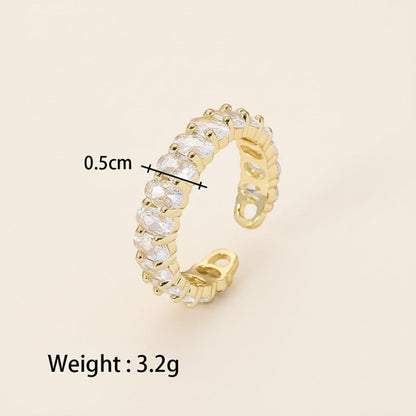 Seraphina Treasures Seraphiel adjustable ring with cubic zirconia stones on a copper base.