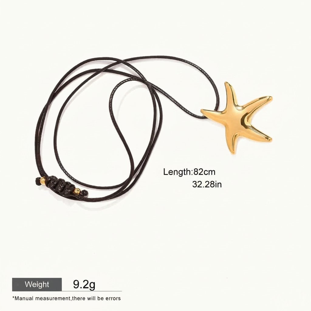 Seraphina Treasures gold starfish pendant on a black waxed rope necklace. Waterproof and hypoallergenic.