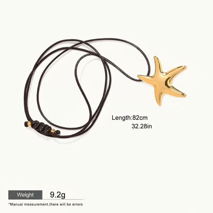 Seraphina Treasures gold starfish pendant on a black waxed rope necklace. Waterproof and hypoallergenic.