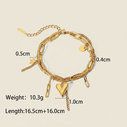 Seraphina Treasures Zorya gold-tone stainless steel bracelet with layered chains, heart and star charms.